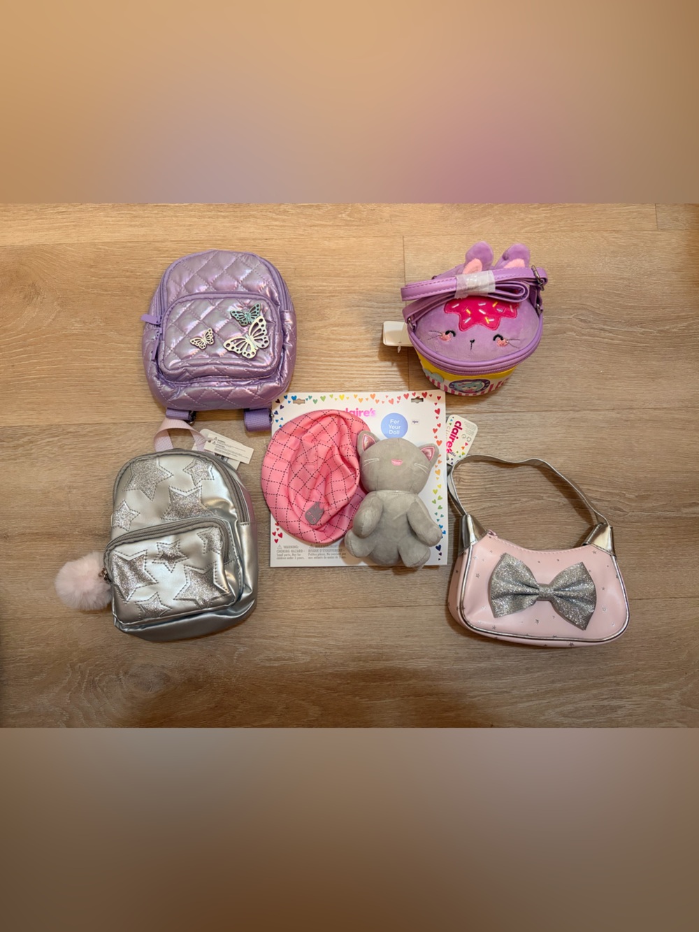 Claire’s bulk Kids Lavender Quilted Mini Backpack with Butterfly Embellishments